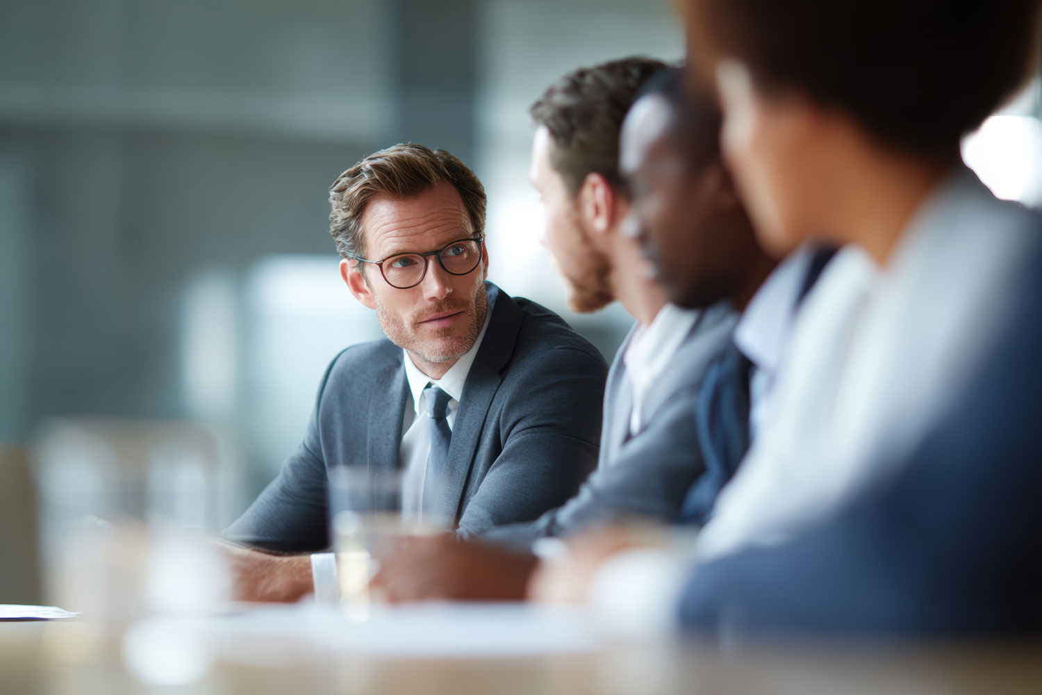 Business colleagues listening to one another during a meeting
